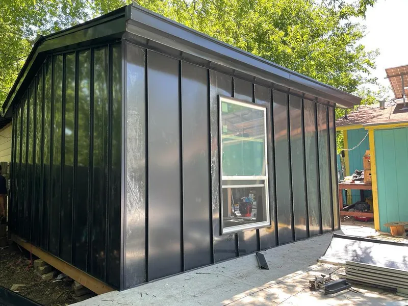 Black standing seam metal wall panels for Metal Roof Installation in Whitfield